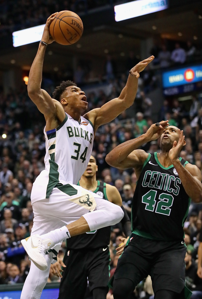 Illustration for article titled Giannis Antetokounmpo Baptized Al Horford And The Photos Were Beautiful